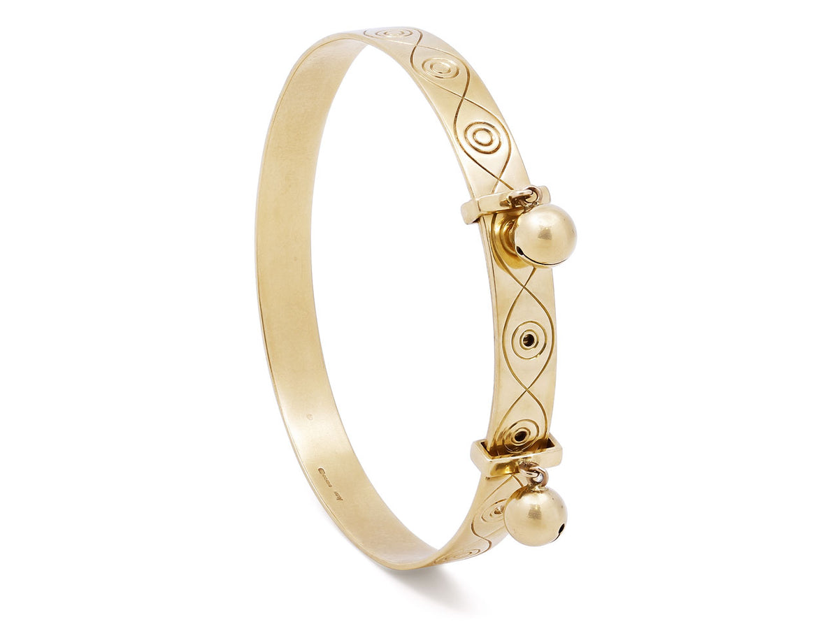 18K gold bangle bracelet with two hanging bells
