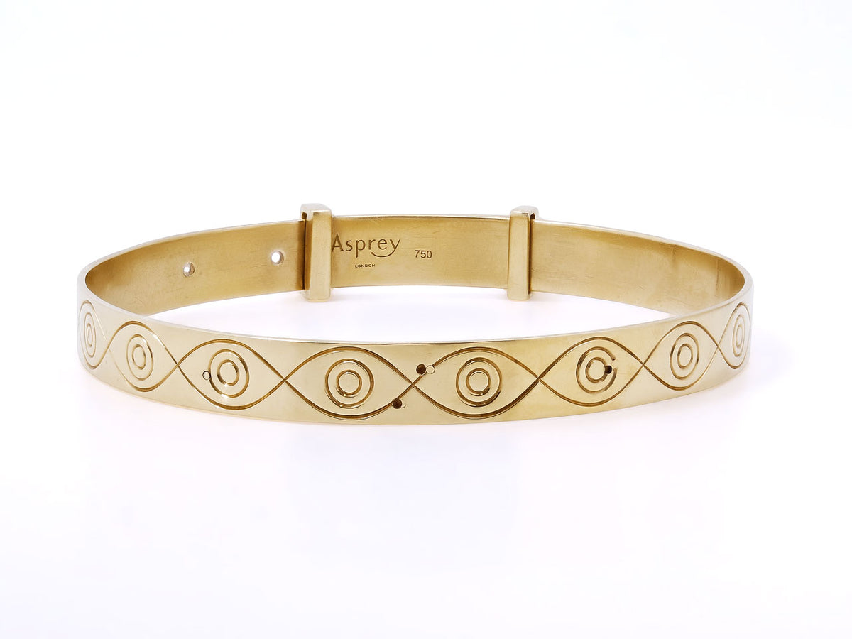 18K gold bangle with engraved circular motifs
