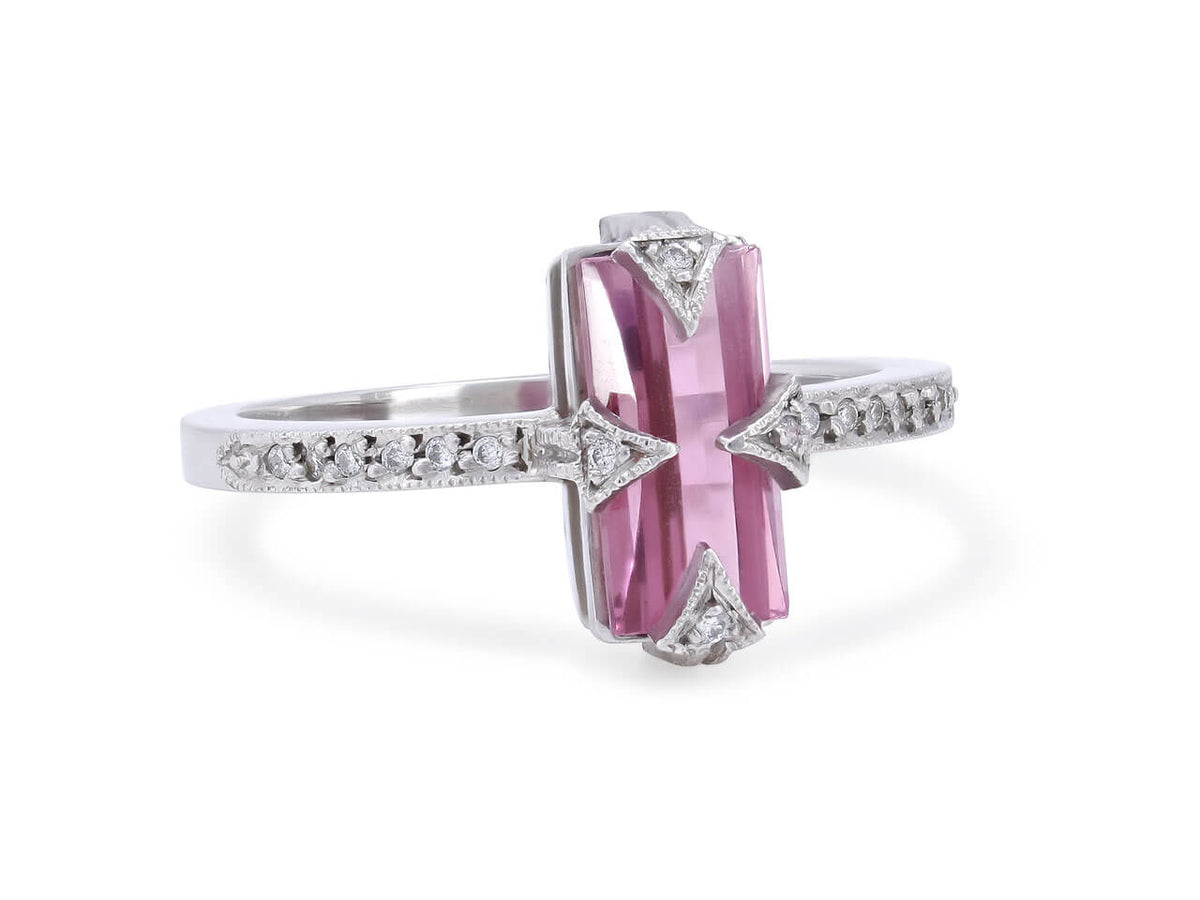 Elongated pink tourmaline and diamond ring in platinum