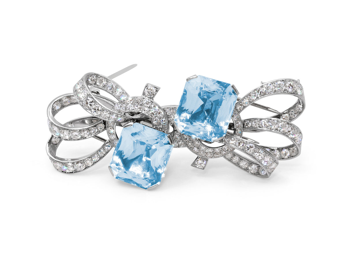 Aquamarine double clip brooch with diamond bow motif