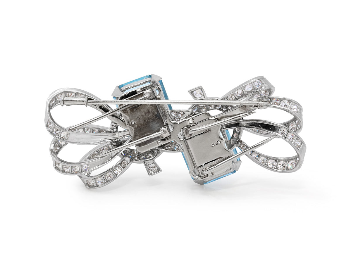 Back view of an aquamarine and diamond bow brooch