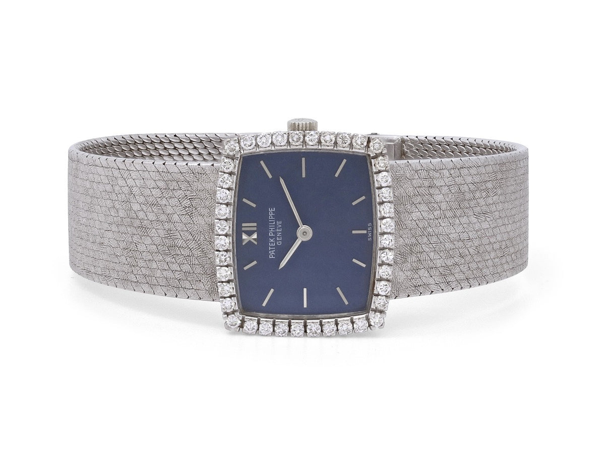 Patek Philippe watch with blue dial and diamond bezel