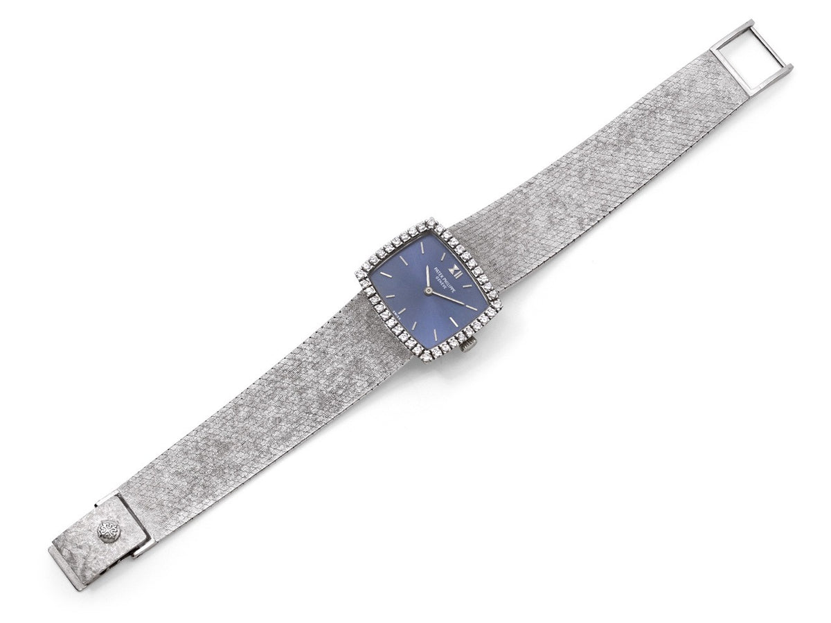 Patek Philippe watch with blue dial and diamond bezel