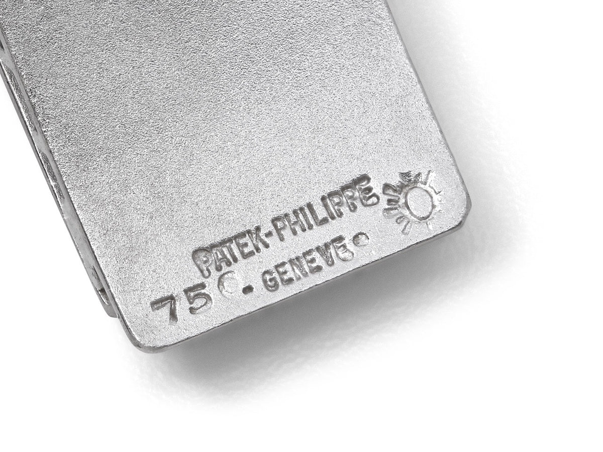 Close-up of engraved Patek Philippe watch clasp