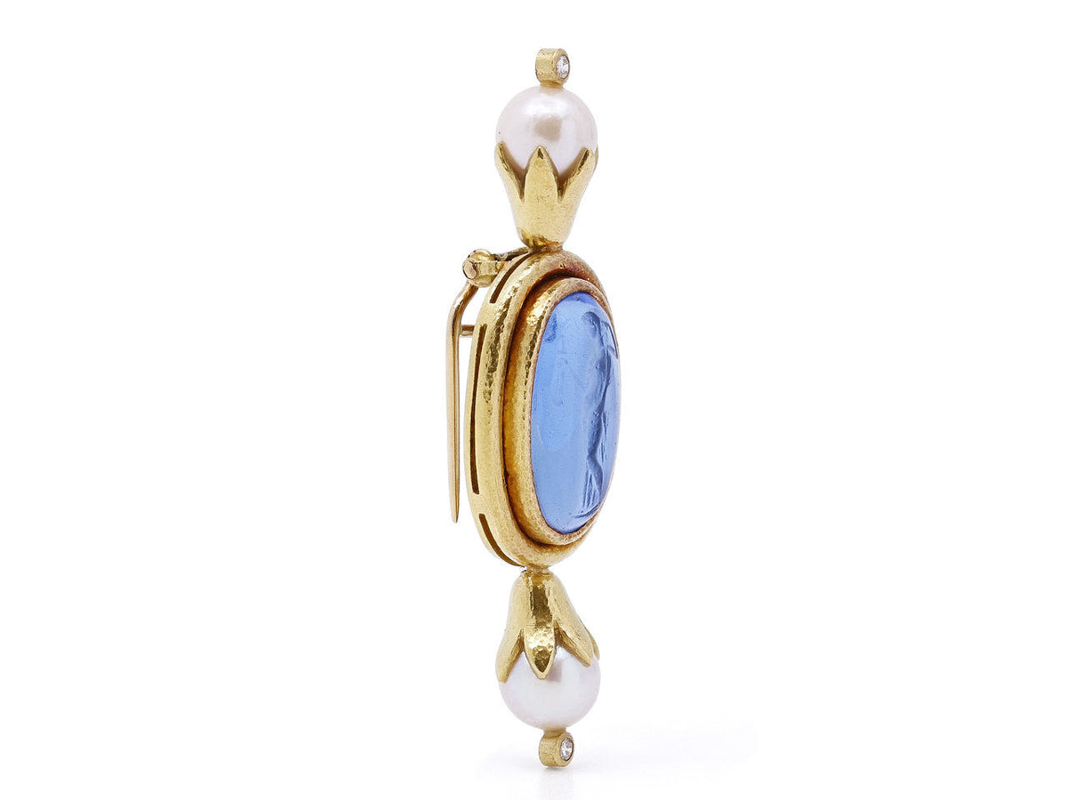 Gold brooch with blue glass intaglio and pearl accents