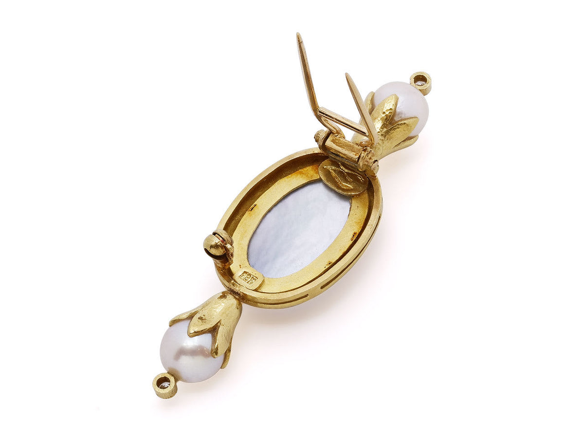 Gold brooch with mother of pearl backing and pearl accents