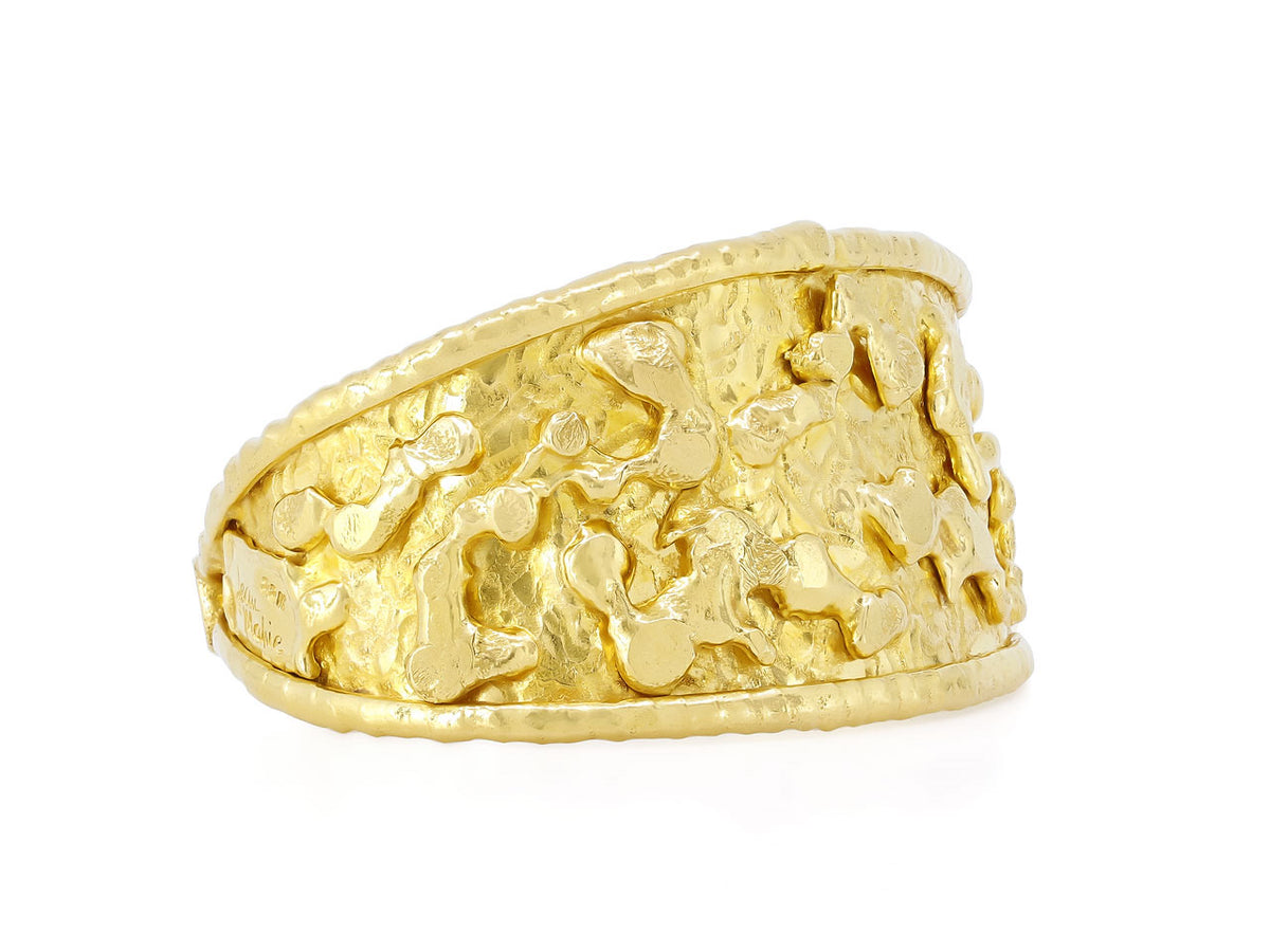 Hand hammered 22K gold cuff bracelet with abstract motifs