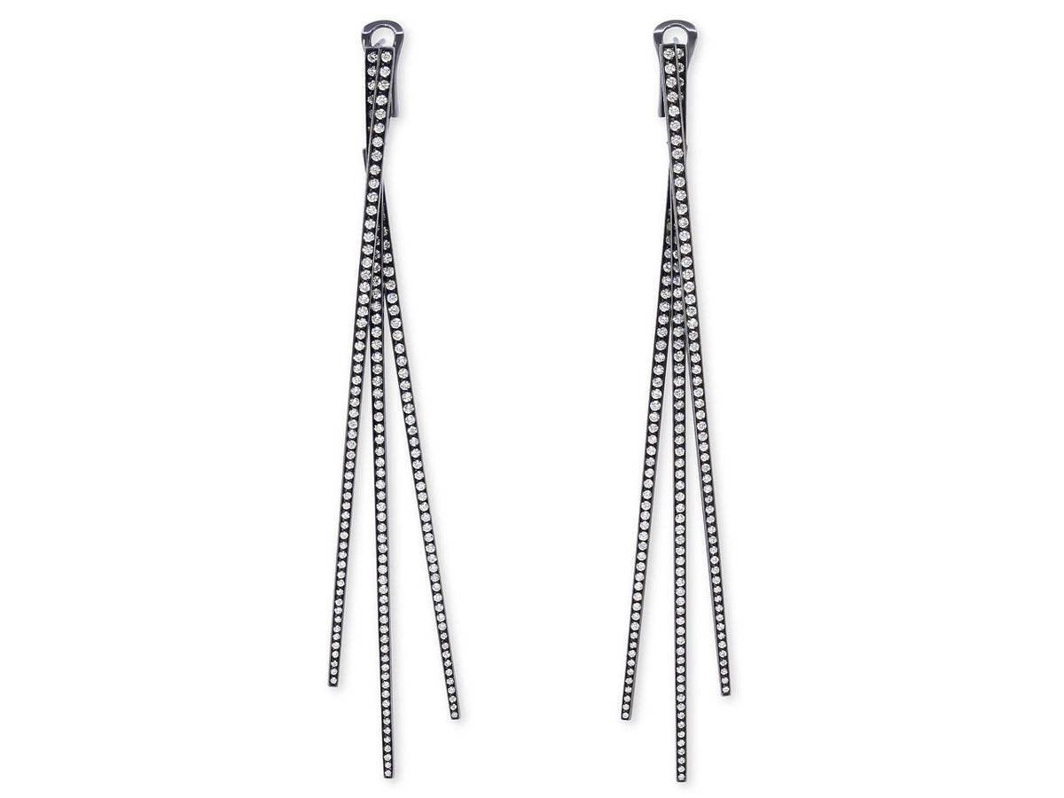 Pair of blackened gold diamond earrings with three spokes