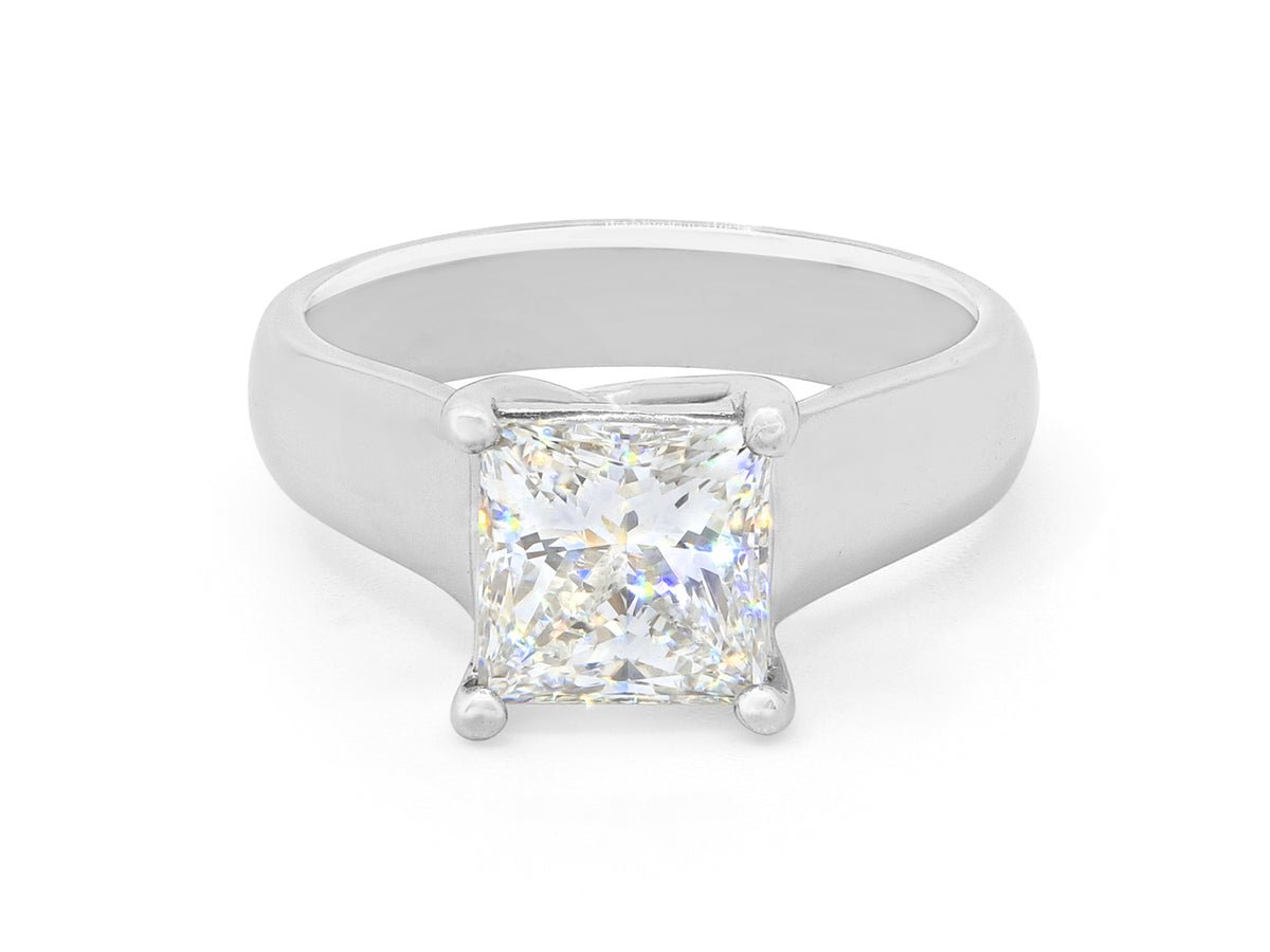Princess cut diamond solitaire ring in platinum with four prongs