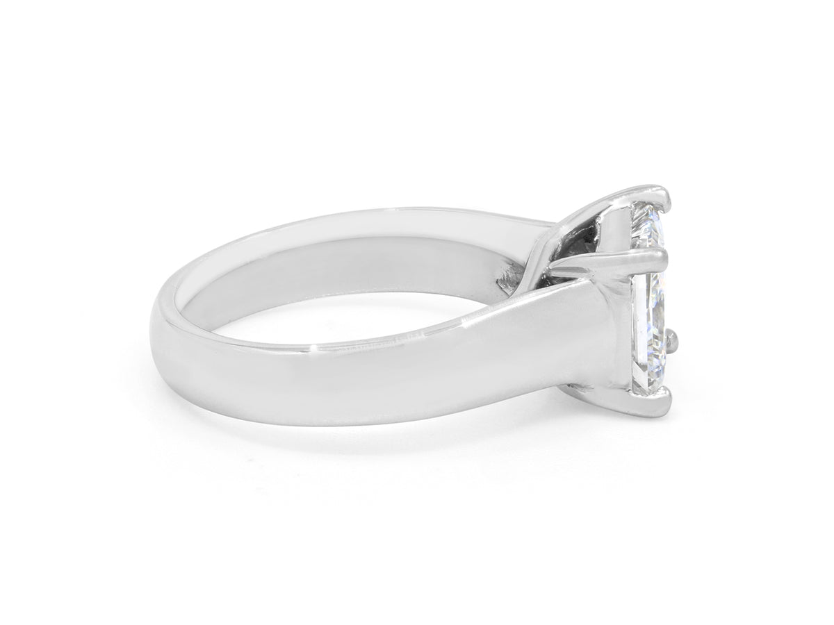 Side view of platinum princess cut diamond solitaire ring