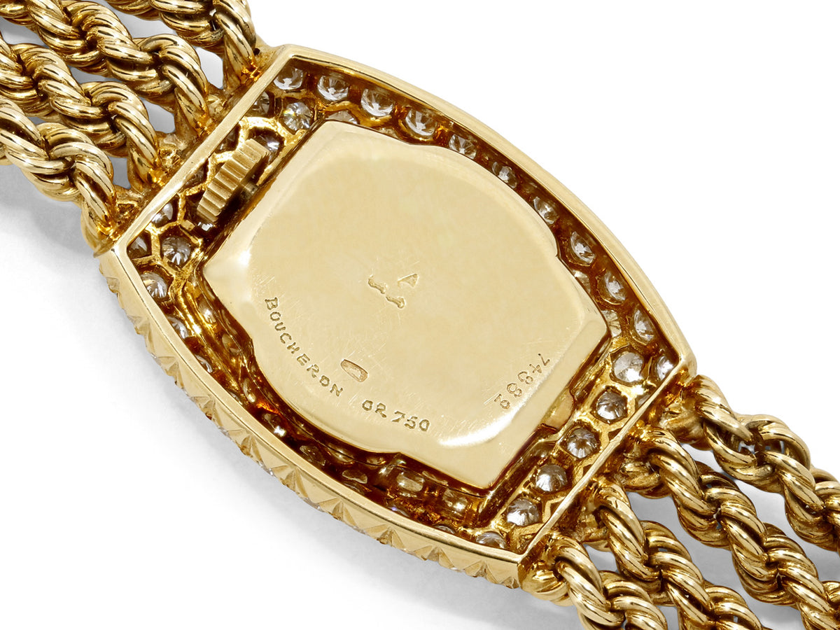 Boucheron 18K gold watch back with diamond bezel