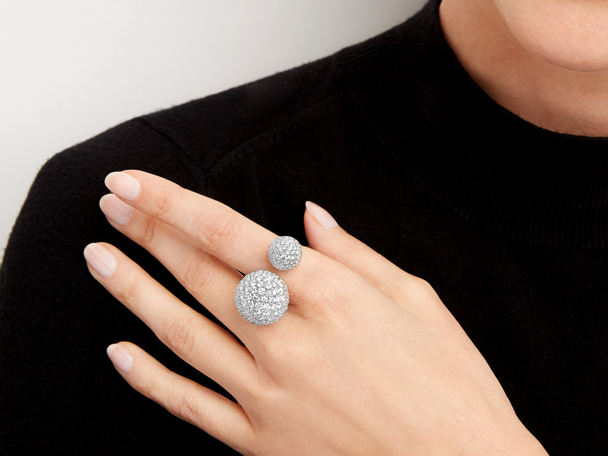 Open white gold ring with two pave diamond balls