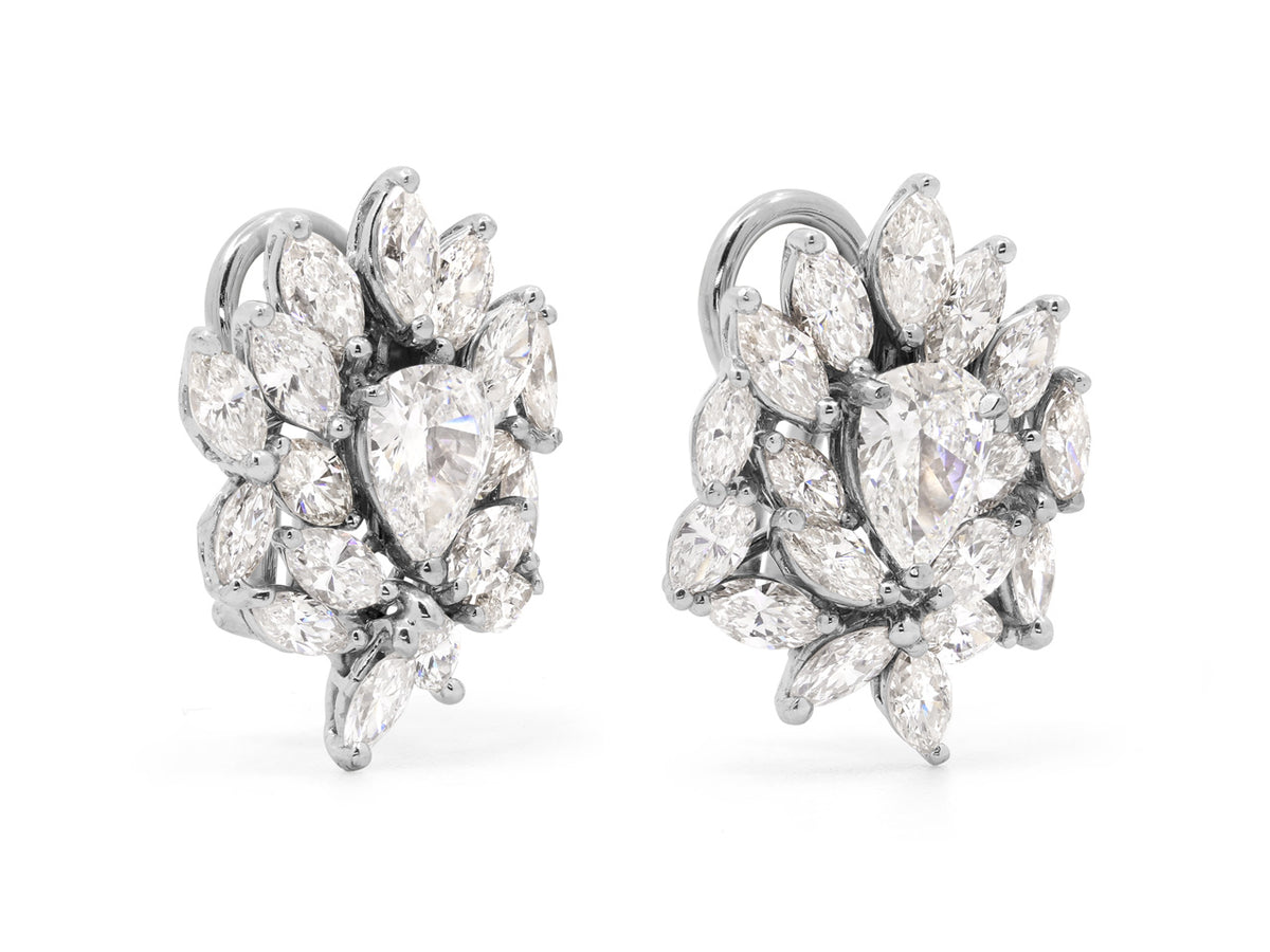 Platinum diamond cluster earrings with pear cut centers