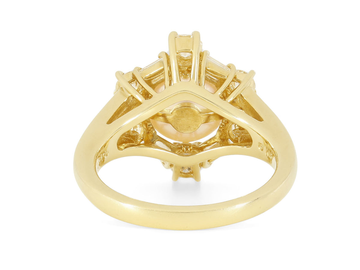 Rear view of an 18K yellow gold pearl and diamond ring setting