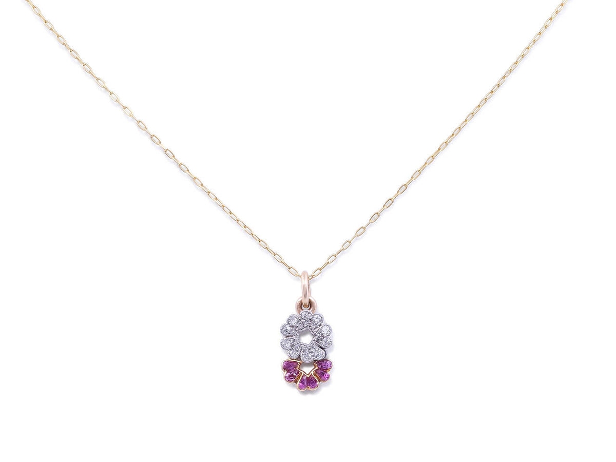 Gold chain with floral diamond and ruby pendant