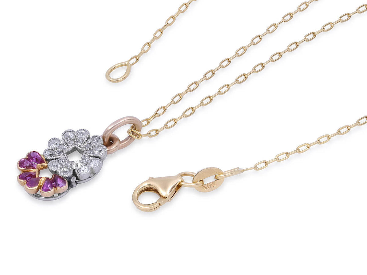 Ruby and diamond floral pendant on an 18K gold chain