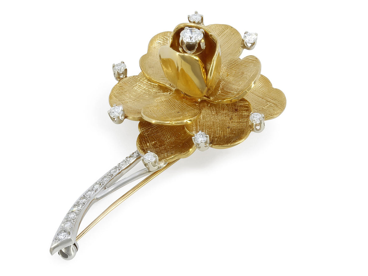 18K gold flower brooch with diamond accents and white gold stem