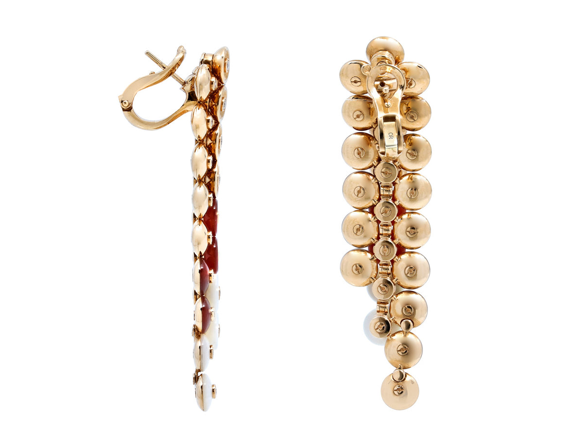 Side and back views of rose gold earrings with gemstones