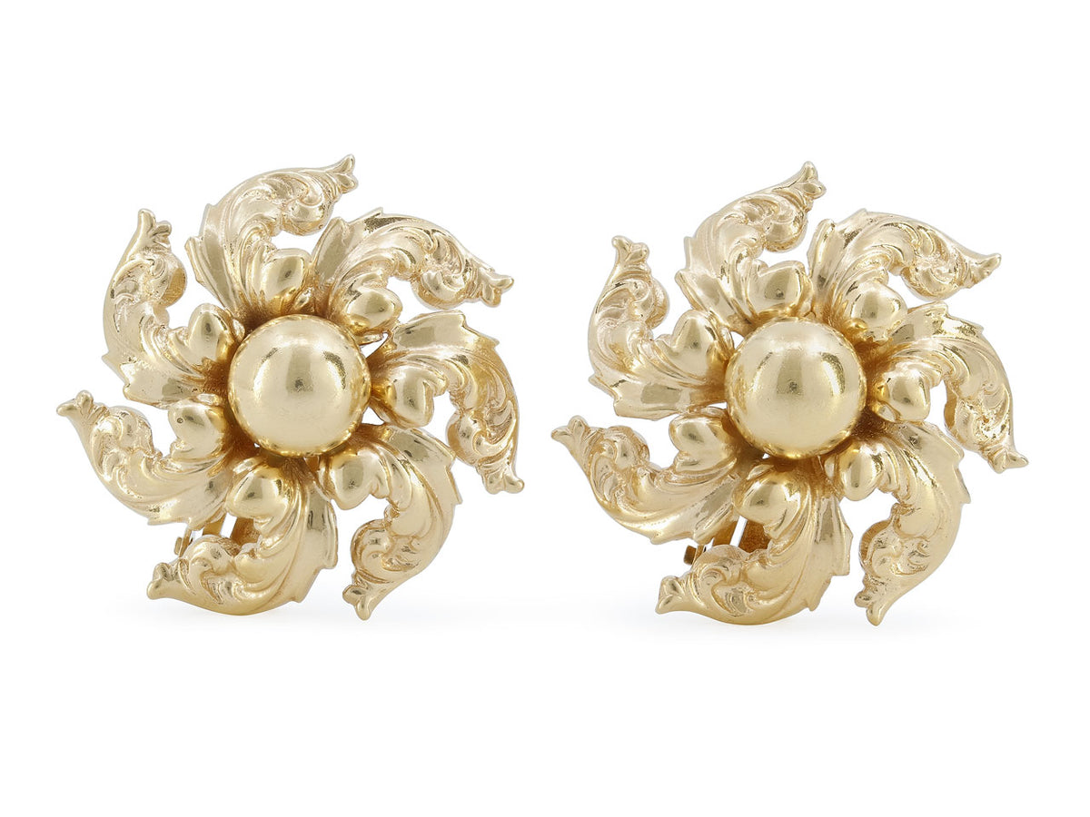 Pair of 14K gold swirl earrings with foliate motifs