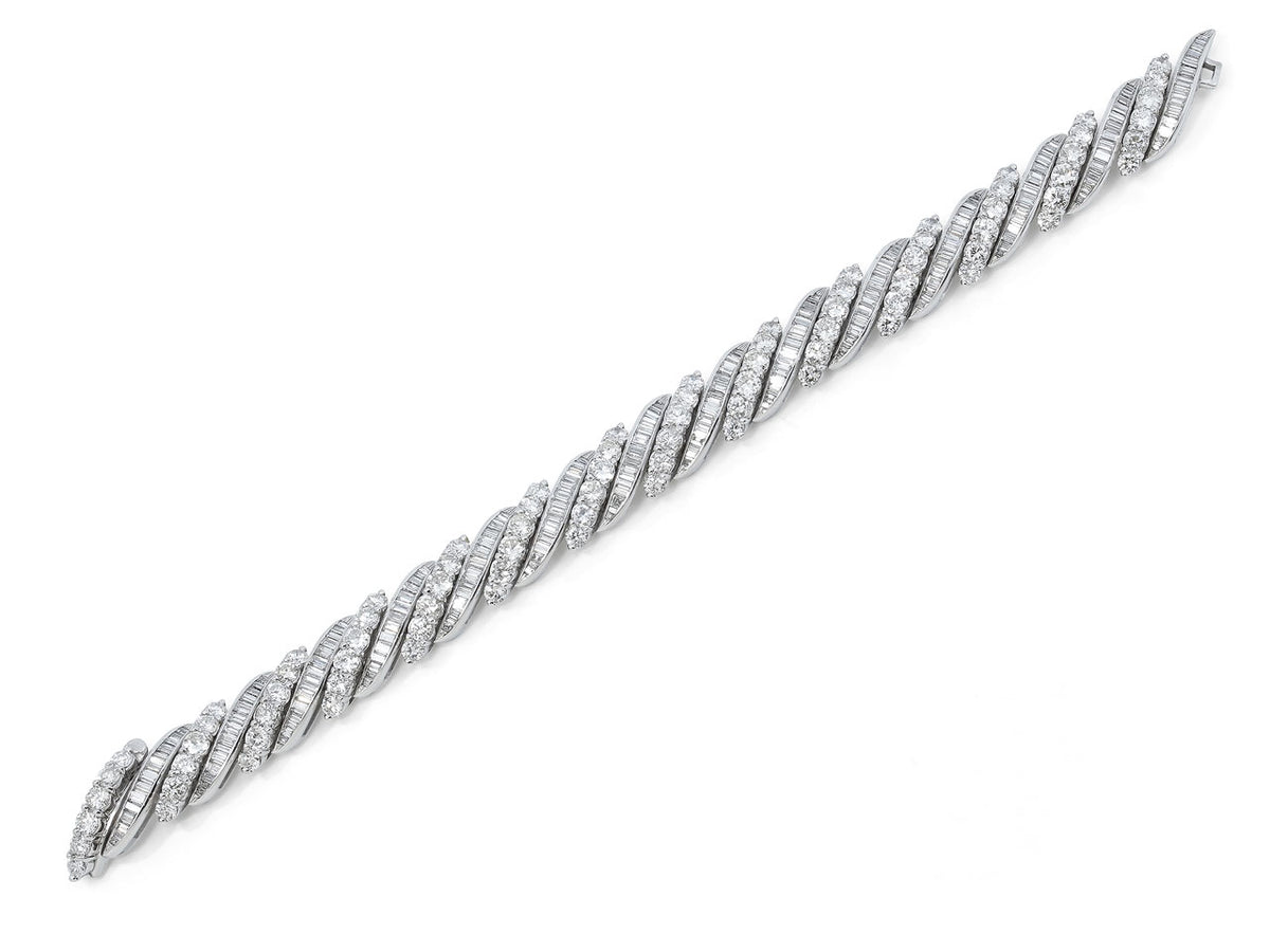 Platinum diamond bracelet with alternating geometric rows