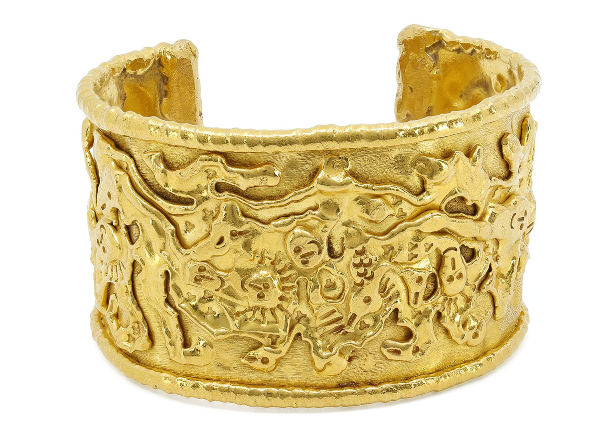 Textured 22K gold cuff bracelet with abstract figures