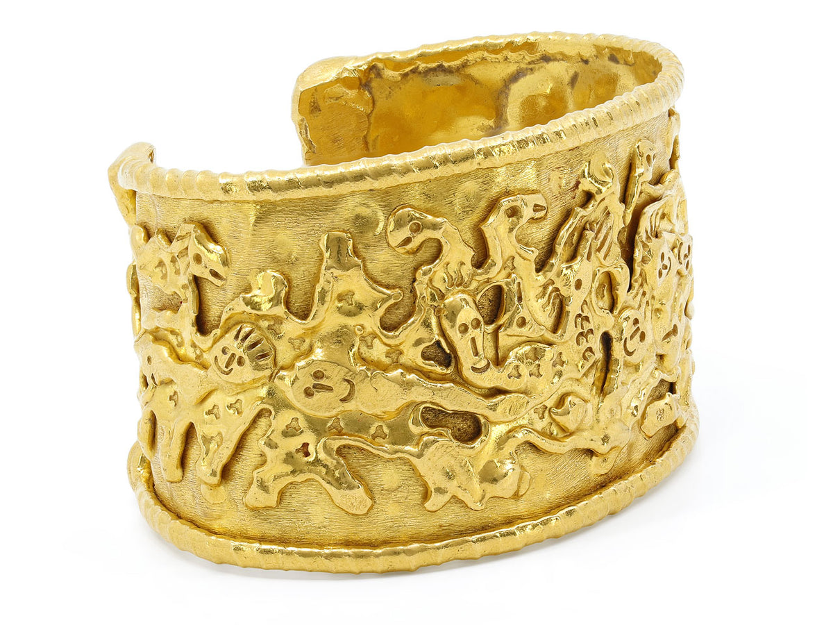 Wide textured 22K gold cuff bracelet with abstract figures