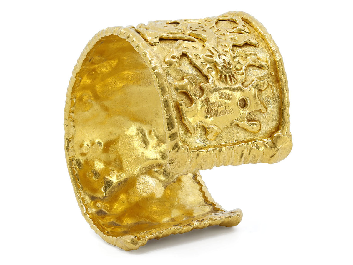 Textured 22K gold cuff with abstract figure motifs
