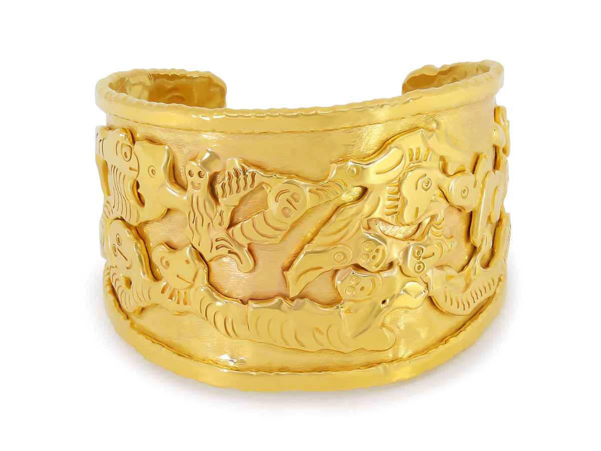 Wide textured 22K gold cuff bracelet with abstract figures