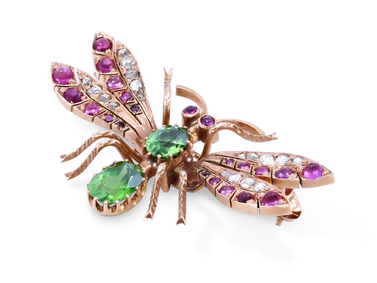 Victorian rose gold insect brooch with diamonds rubies and green gemstones