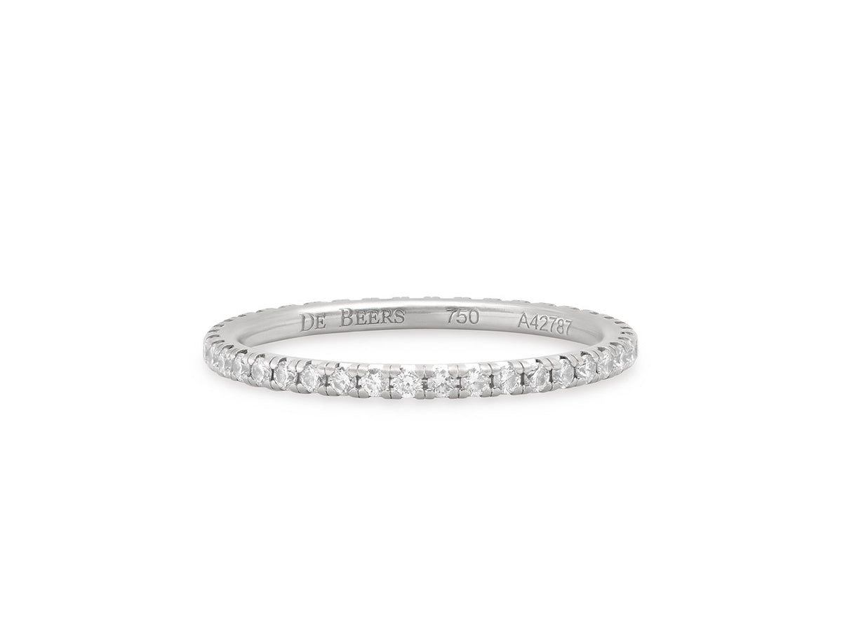 White gold diamond eternity band with prong set stones