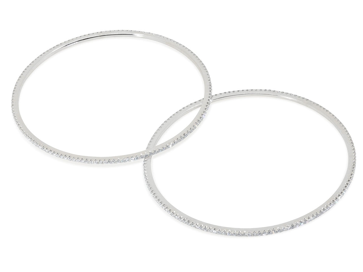 Two diamond bangles in 18K white gold