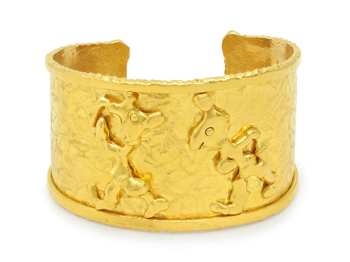 Textured 22K gold cuff bracelet with abstract figures