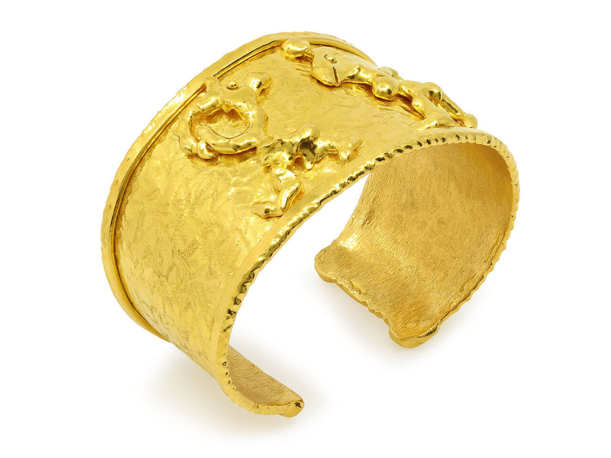 Textured 22K gold cuff bracelet with two figures