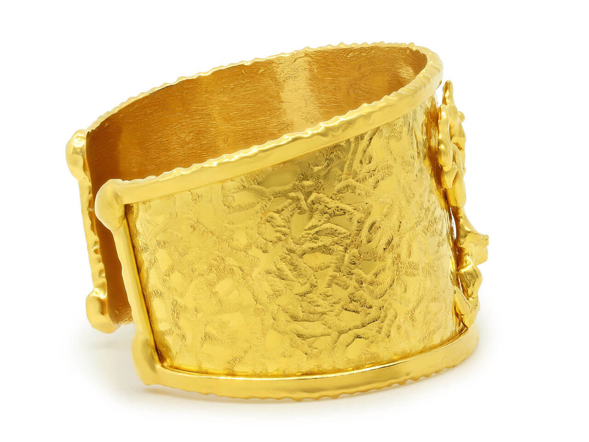 Wide textured 22K gold cuff bracelet with abstract figures