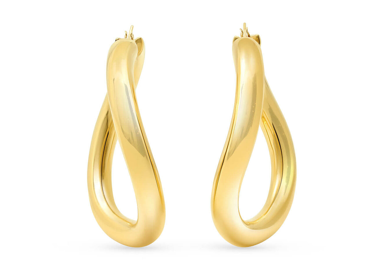Pair of sculptural 18K gold curved hoop earrings