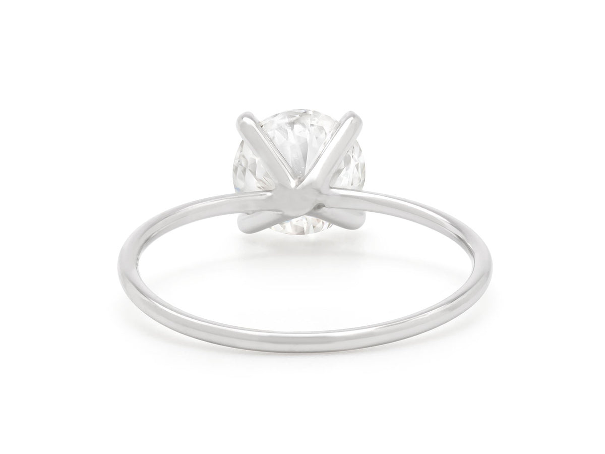 Platinum ring with a prong set round diamond