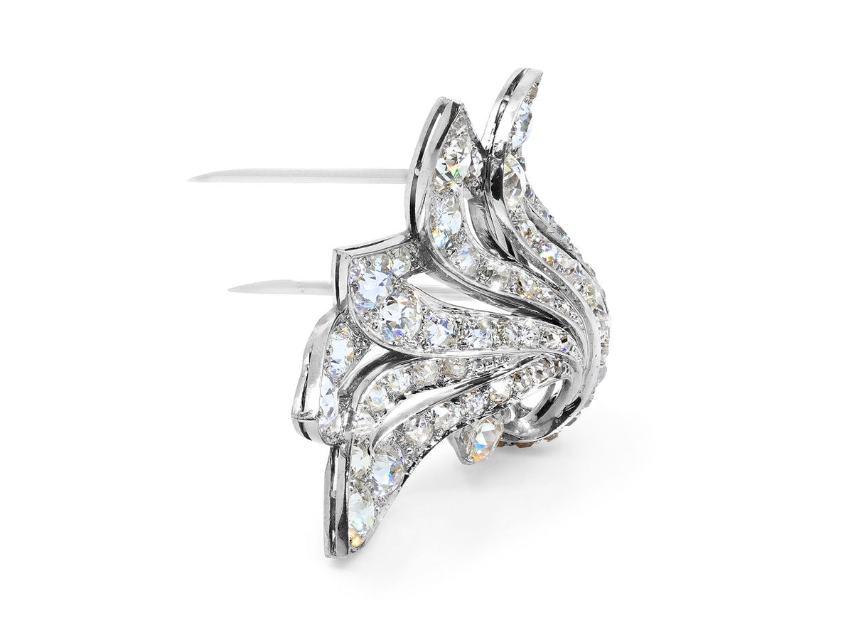 Platinum Art Deco diamond brooch with swirling leaves