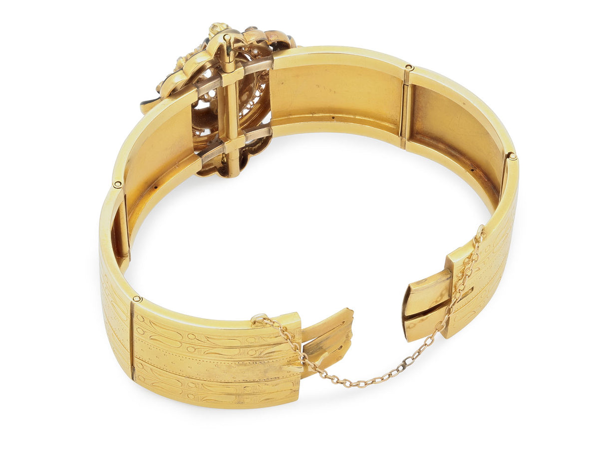 Open antique gold bracelet with hinged clasp and safety chain