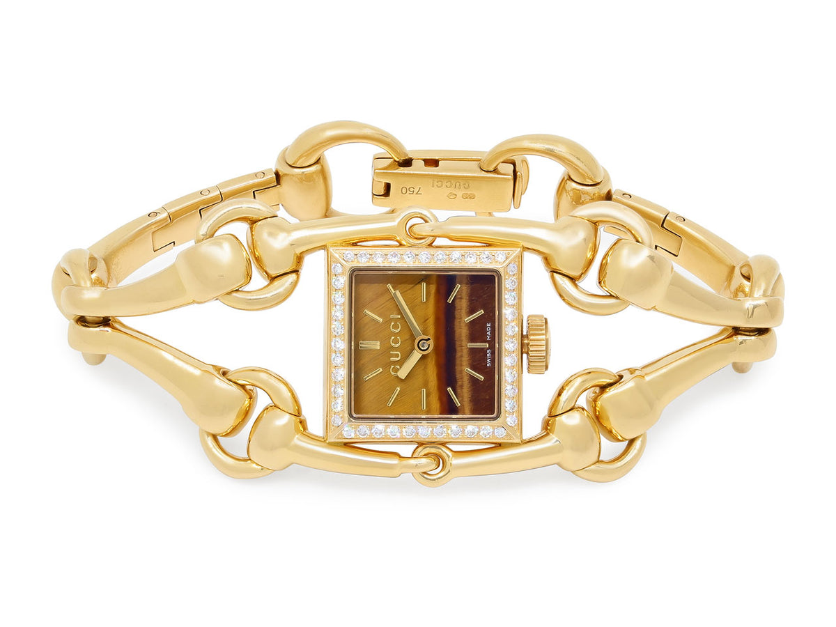 Gucci gold horsebit watch with tiger eye dial and diamond bezel