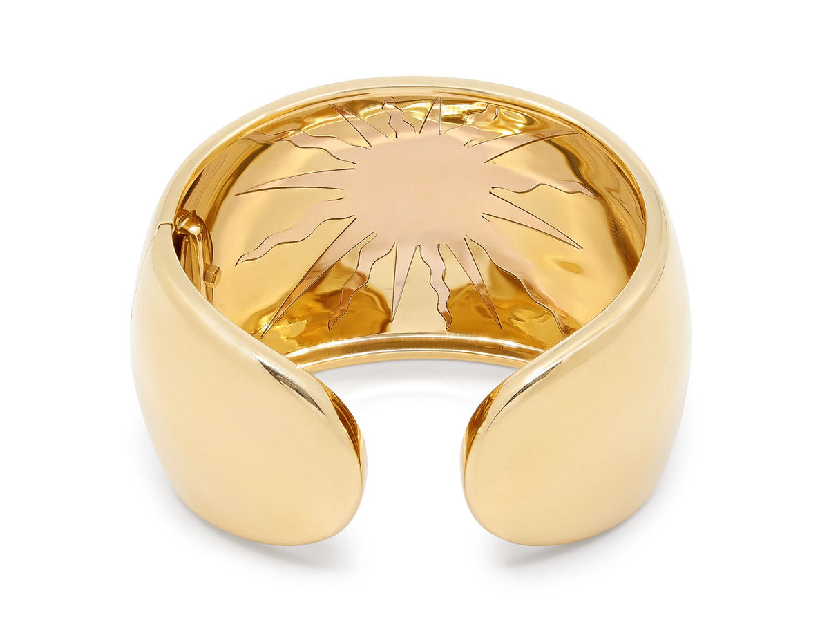 Domed 18K gold cuff bracelet with sun motif