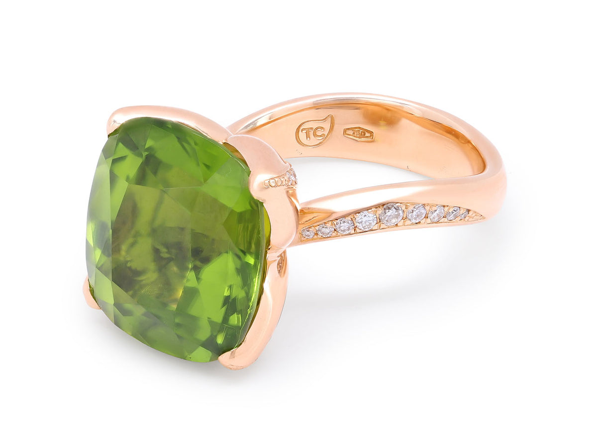 Cushion cut peridot ring with diamond pave band