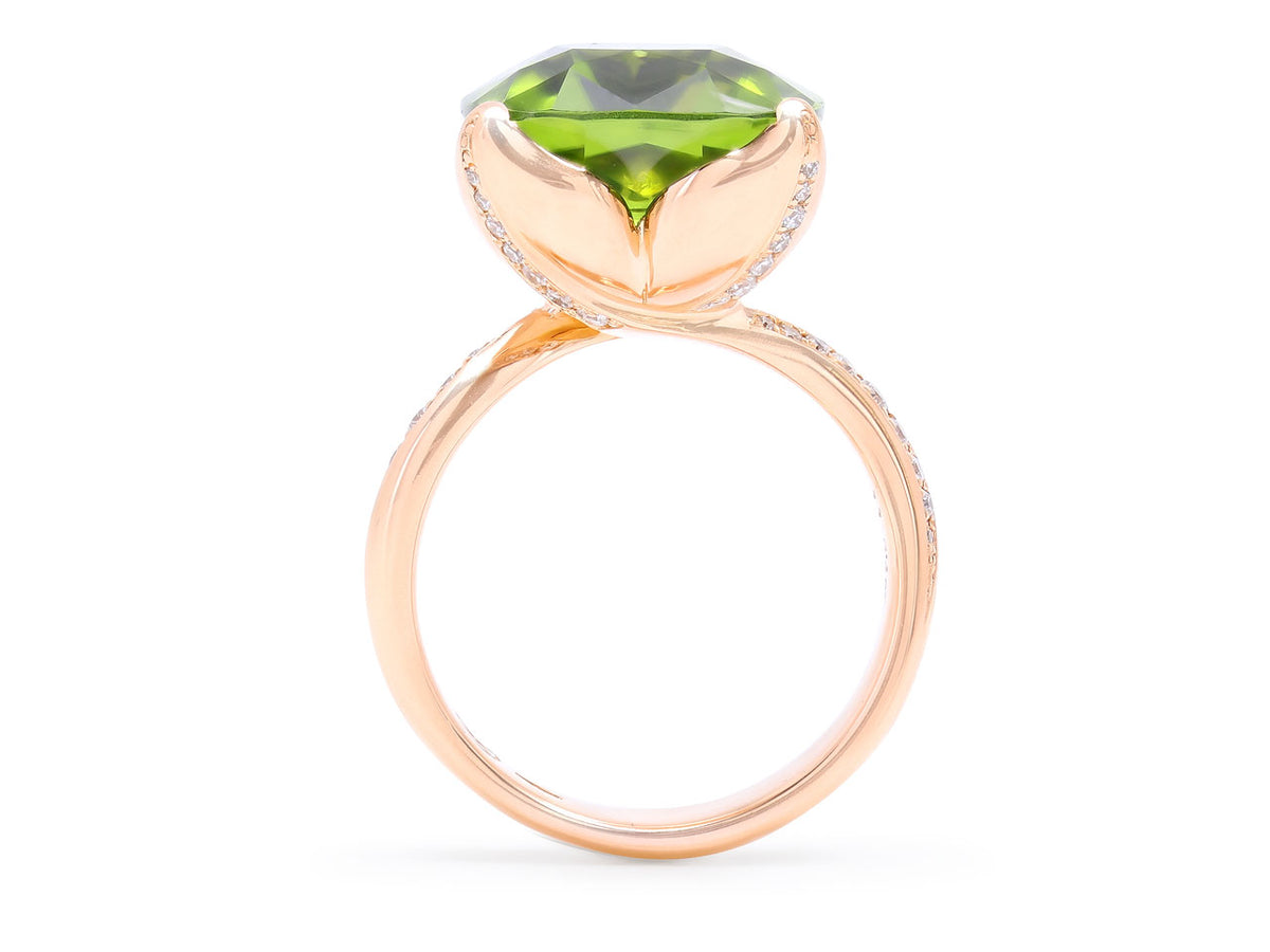 Cushion cut peridot ring with diamond pave band