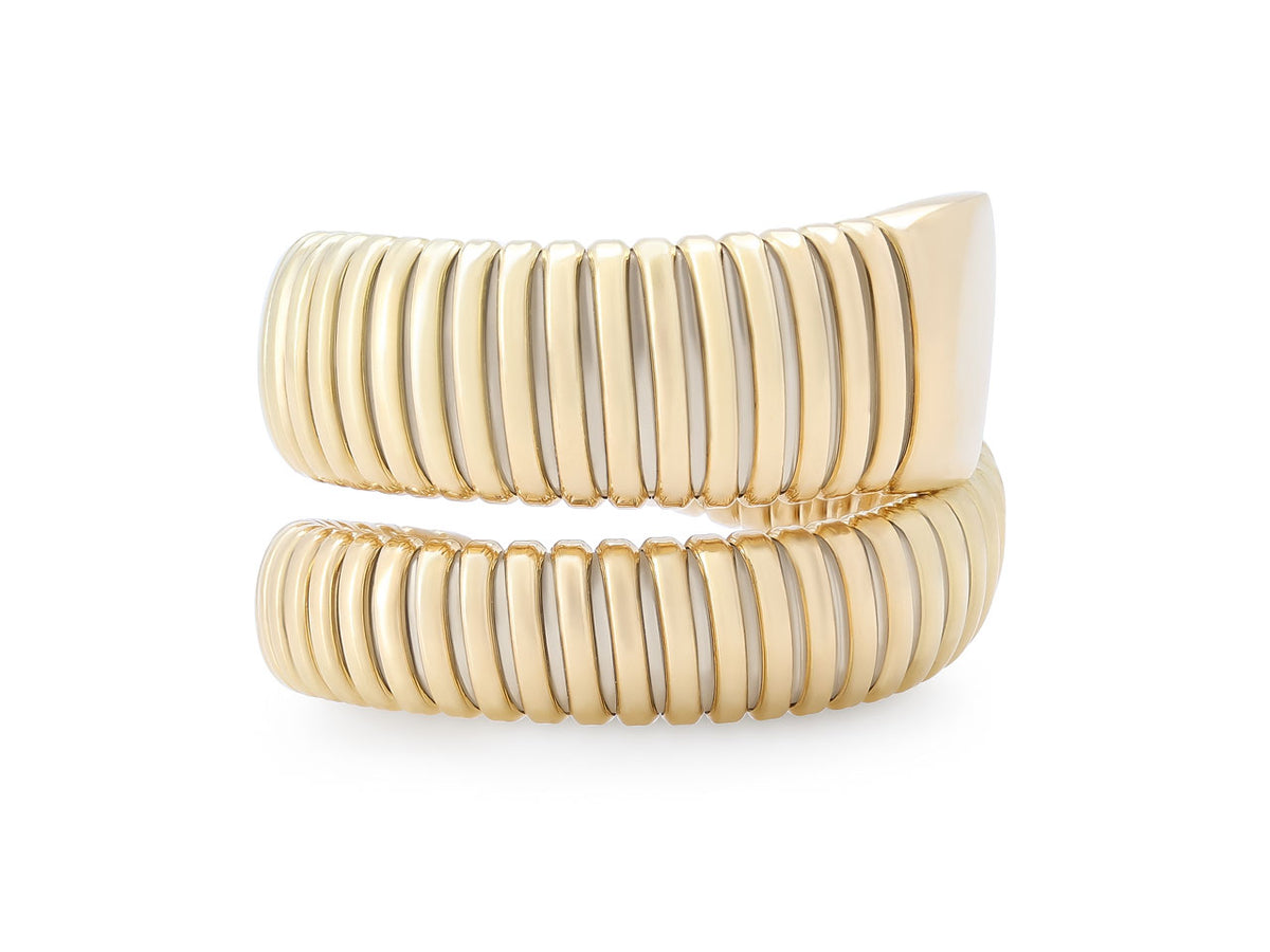 18K yellow gold bypass tubogas ring with ribbed coils