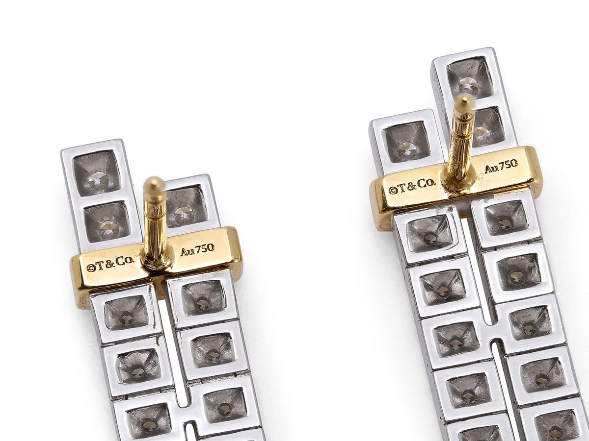 Close view of platinum and gold drop earring backs