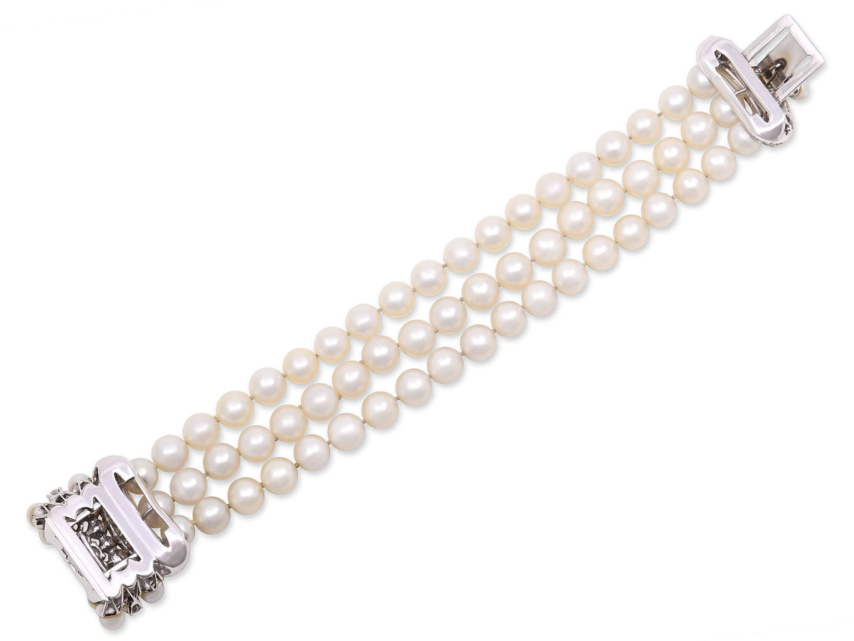 Three strand pearl bracelet with diamond pave clasp