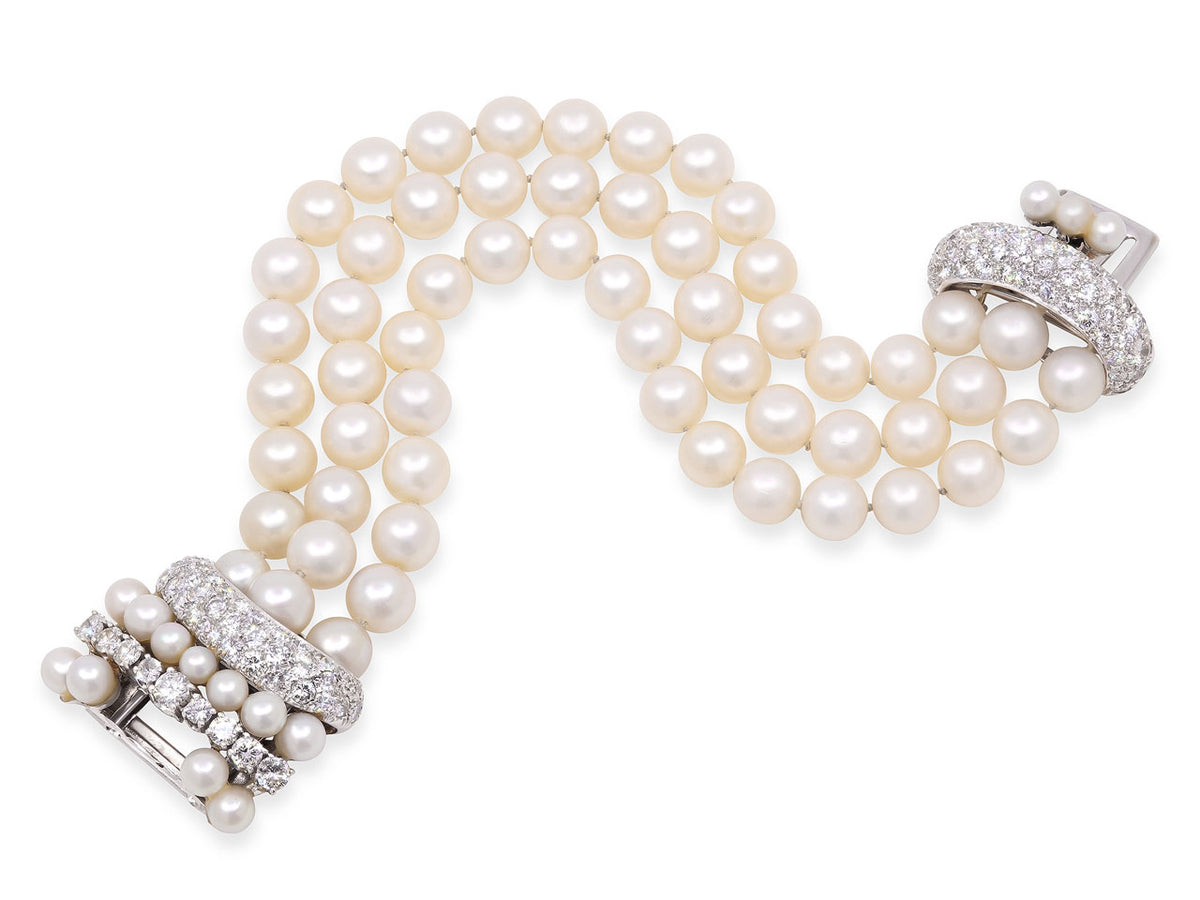 Three strand pearl bracelet with diamond pave clasps in white gold