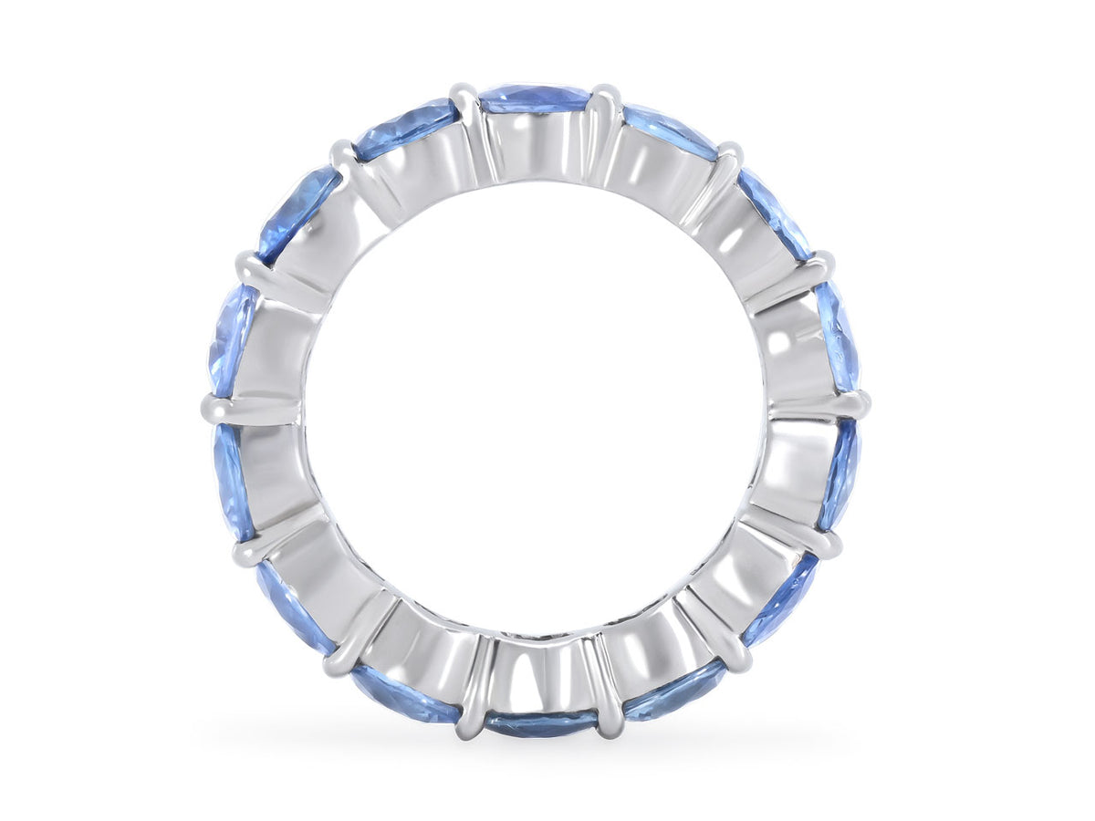 Platinum eternity band with blue sapphires