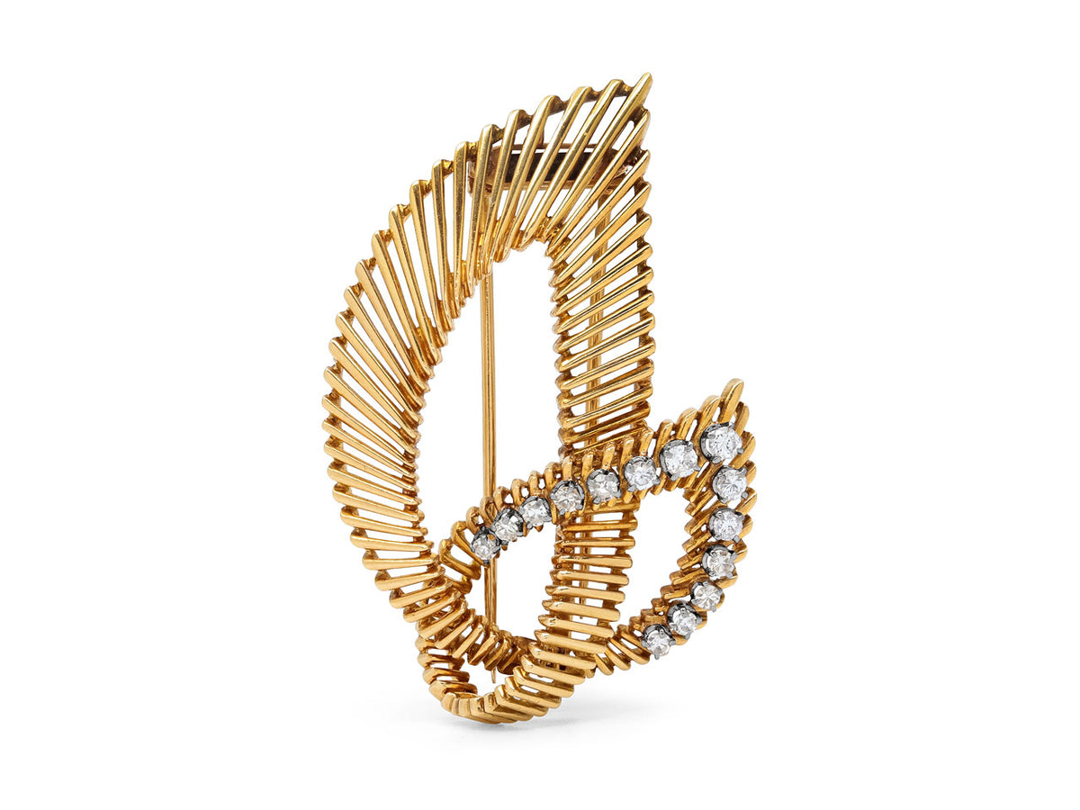 Openwork 18K gold double leaf brooch with diamonds
