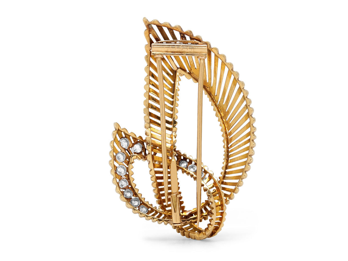 Openwork 18K gold double leaf brooch with diamonds