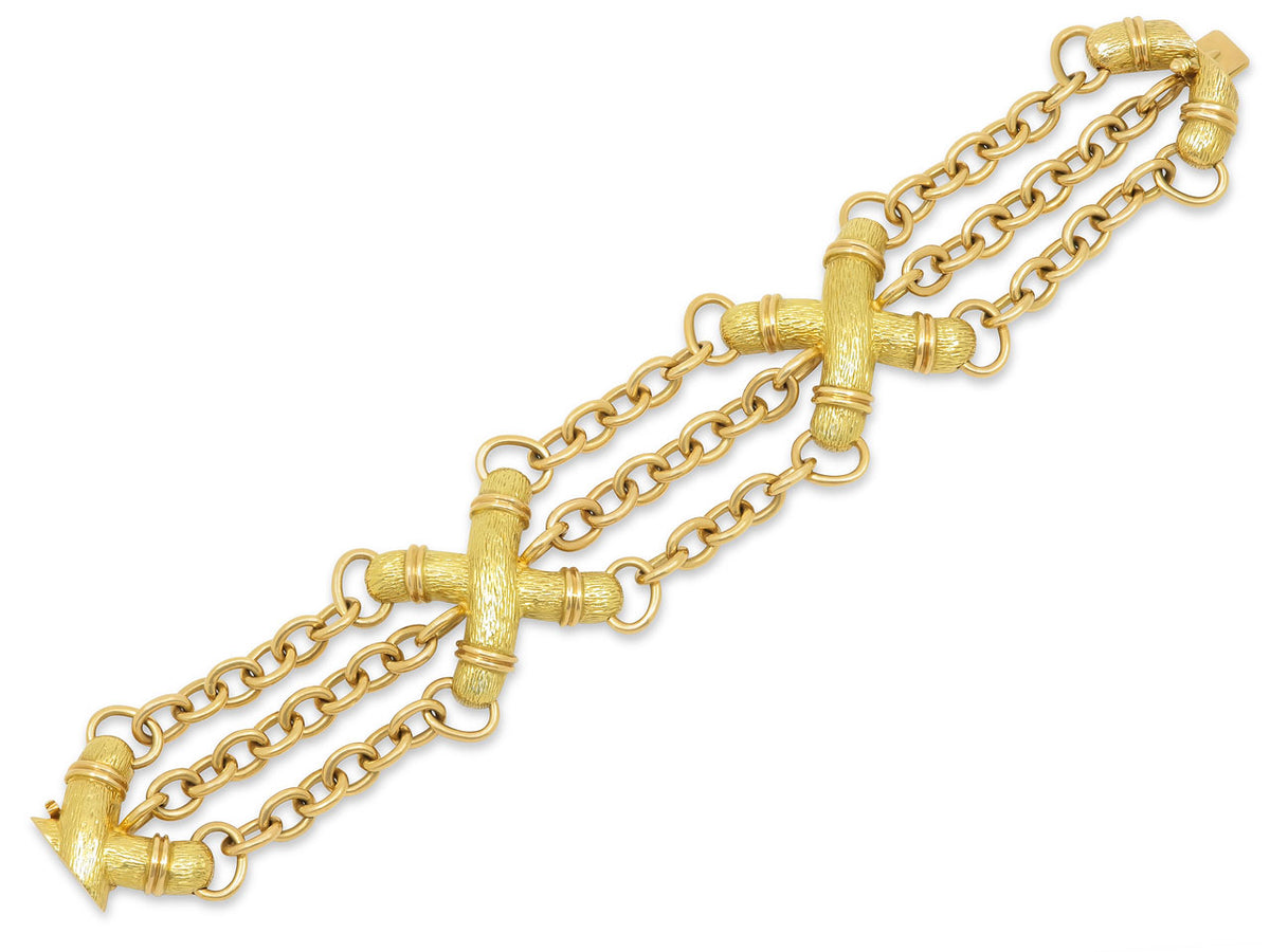 Triple strand 18K yellow gold bracelet with textured X links